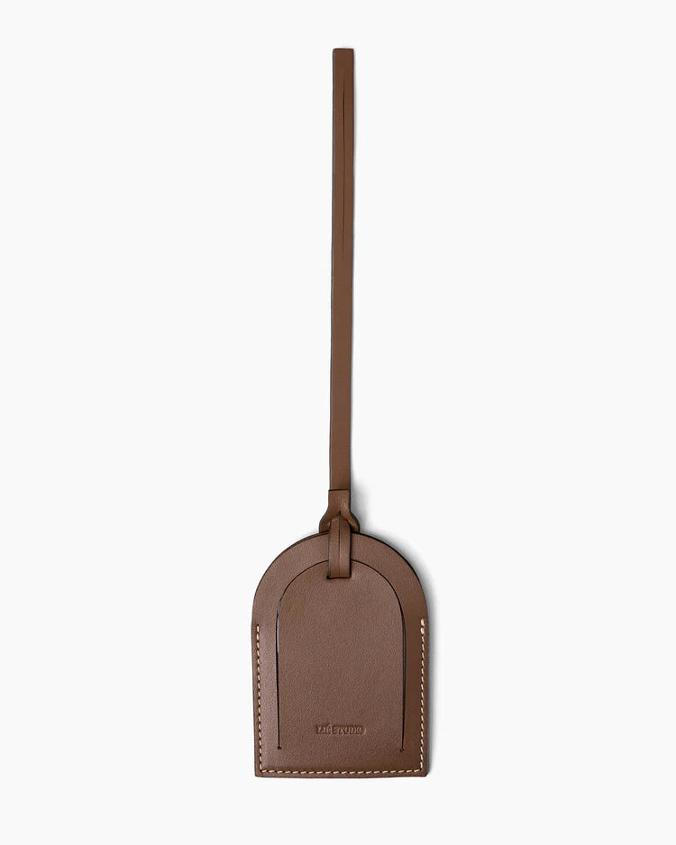 LIÉ Studio Sally Luggage Tag in Taupe | Shop Tula