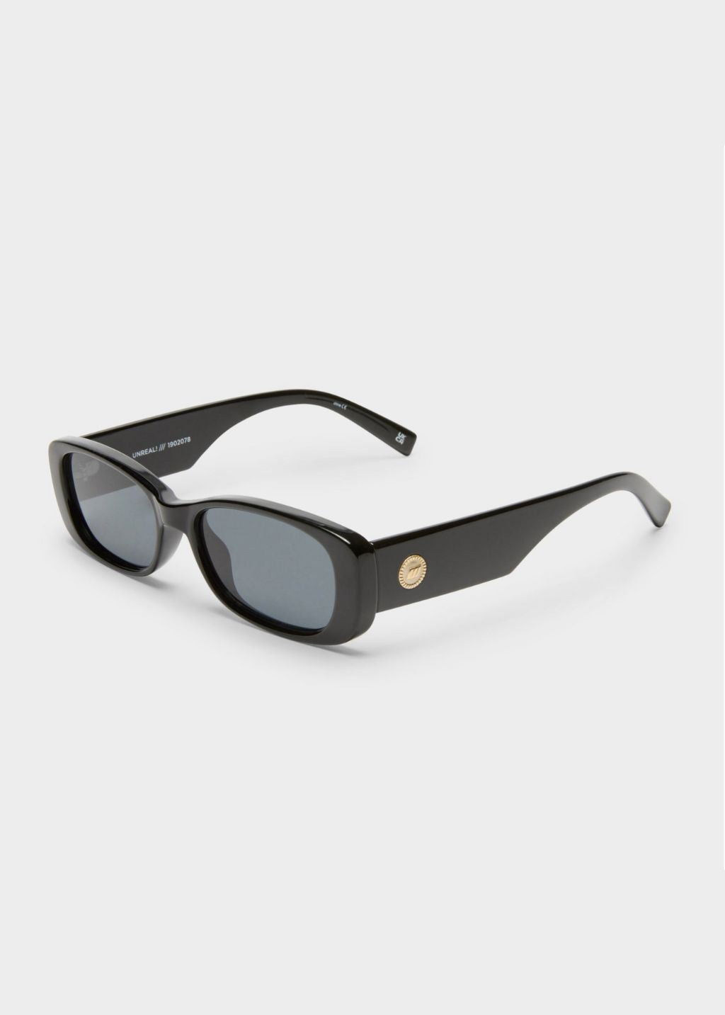Le Specs Unreal Sunshades in Black | Shop Tula