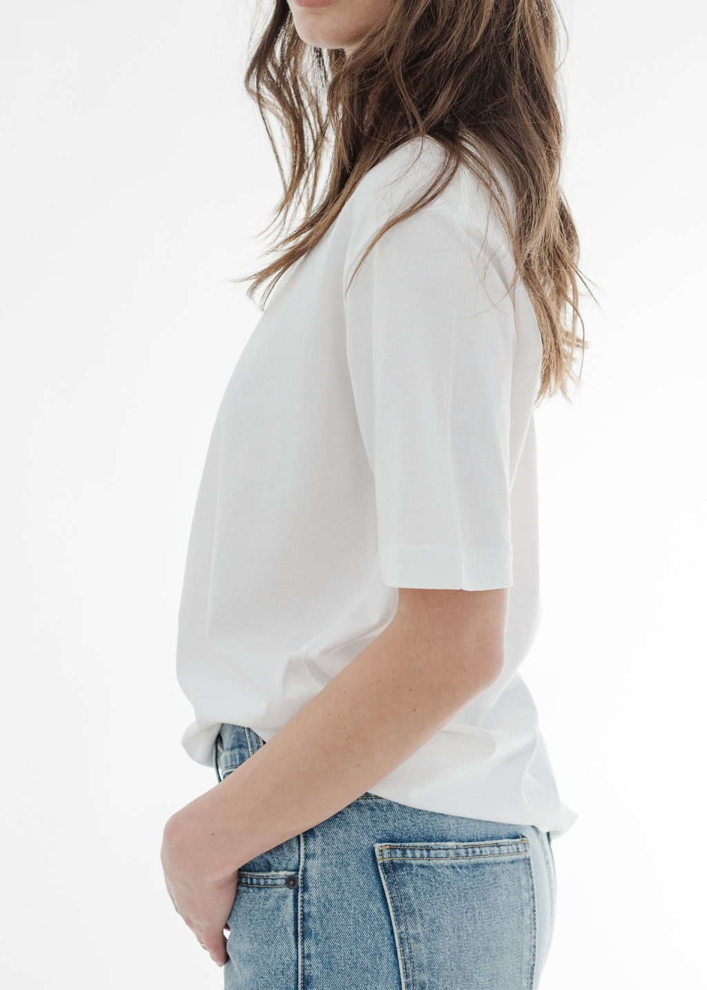 Tibi Mock Neck Unisex T-Shirt in White | Shop Tula