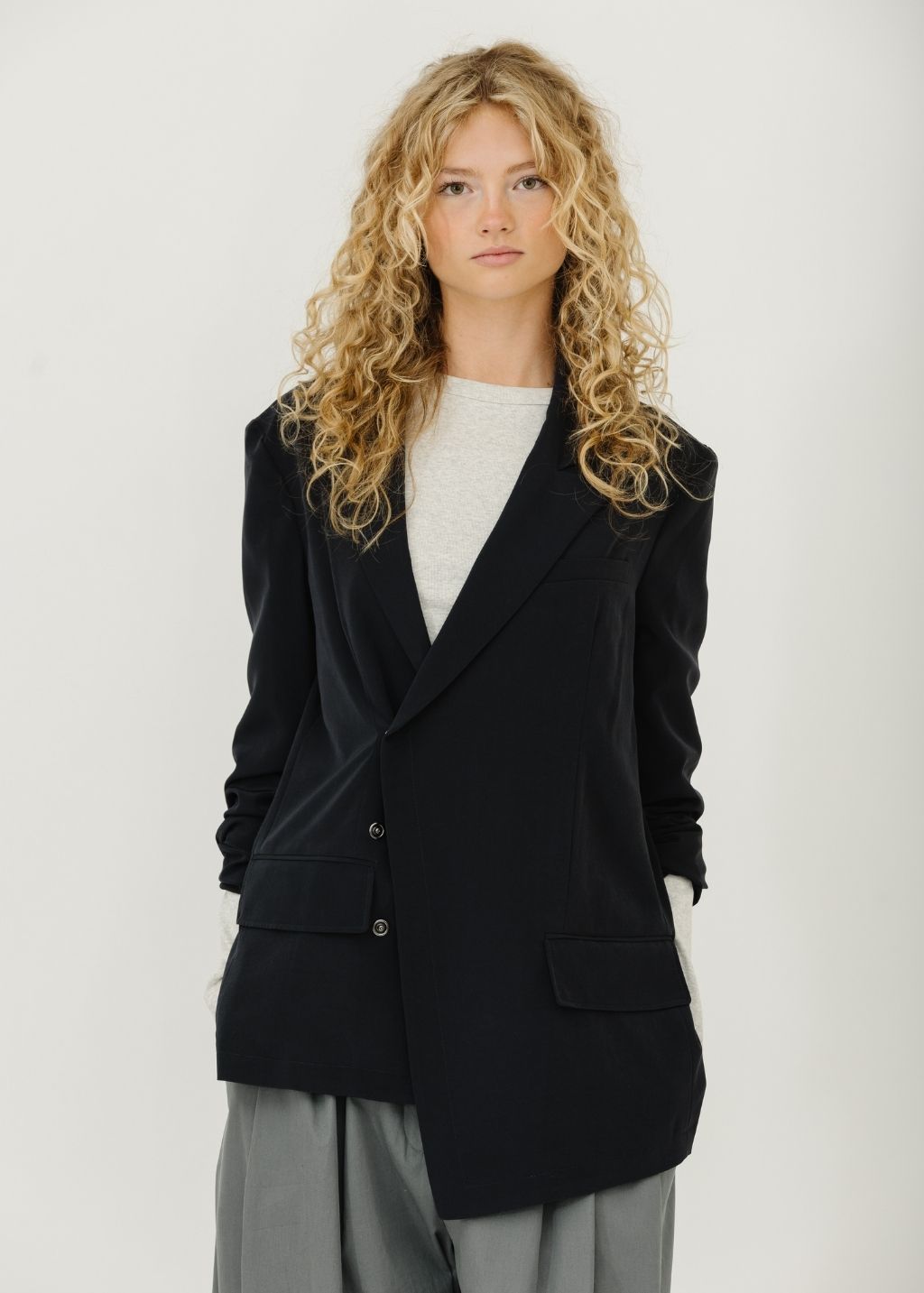 Tibi Relaxed Suiting Asymmetrical Wrap Blazer in Navy | Shop Tula