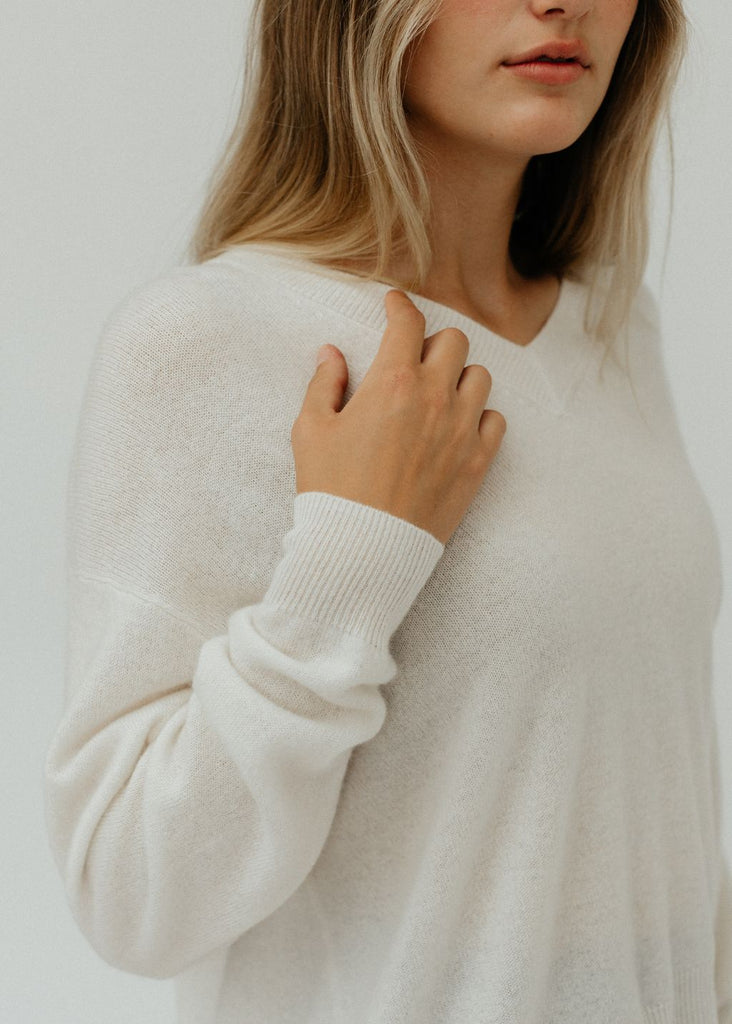 Elizabeth V-Neck Cashmere Sweater in White details  | Tula's Online Boutique