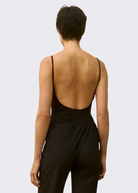 FLORE FLORE Carli Bodysuit in Black | Shop Tula