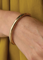 Jenny Bird Gia Bangle in Gold | Shop Tula