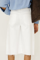 MOTHER Denim The Whole Lot Zip Twist Fray Shorts in Totally Innocent | Shop Tula