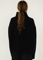 Sablyn Mock Neck Drop Shoulder Sweater in Black Back | Shop Tula