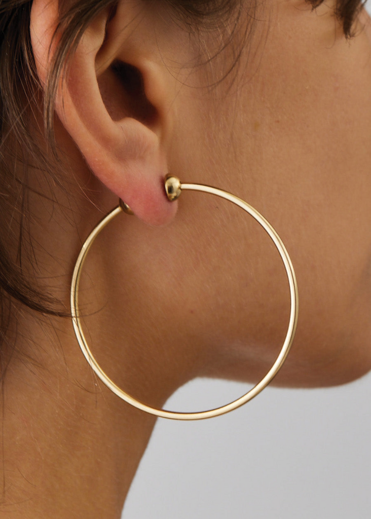 Jenny Bird Medium Icon Hoops in Gold Model | Tula's Online Boutique