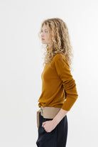 Tibi Feather Weight Ribbed Turtle Neck Pullover in Ochre | Shop Tula