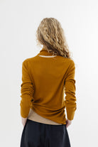 Tibi Feather Weight Ribbed Turtle Neck Pullover in Ochre | Shop Tula