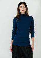 Tibi Feather Weight Ribbed Turtle Neck Pullover in Seal | Shop Tula