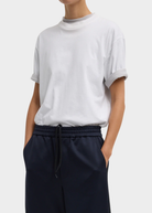 Tibi Mock Neck Unisex T-Shirt in White | Shop Tula
