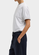 Tibi Mock Neck Unisex T-Shirt in White | Shop Tula